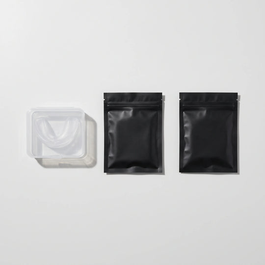 Silent Night Kit — Nightpiece in its case, nasal strips and mouth tape laid out flat